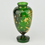 An old-fashioned glass vase with a porcelain plate, hand painting