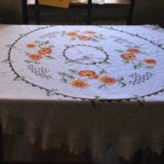 An old fashioned embroidered round tablecloth