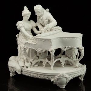 Antique biscuit porcelain figure , rococo style , man and woman with piano