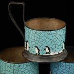 Vintage Russian teaglass holders with enamel design, penguins