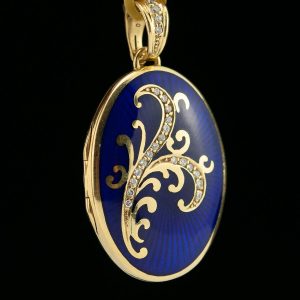 Gold medalion pendant with blue enamel