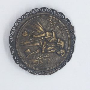 Metal brooch