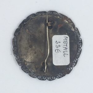 Metal brooch