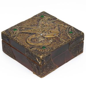 Antique wood box with bronze bird decorations