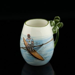 Souvenir porcelain cup with a rower