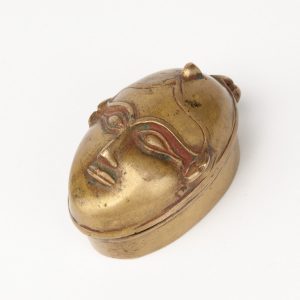 Antique bronze box , head shape
