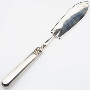 Antique silver serving tool