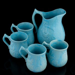 Antque light blue ceramic jug with 4 mugs