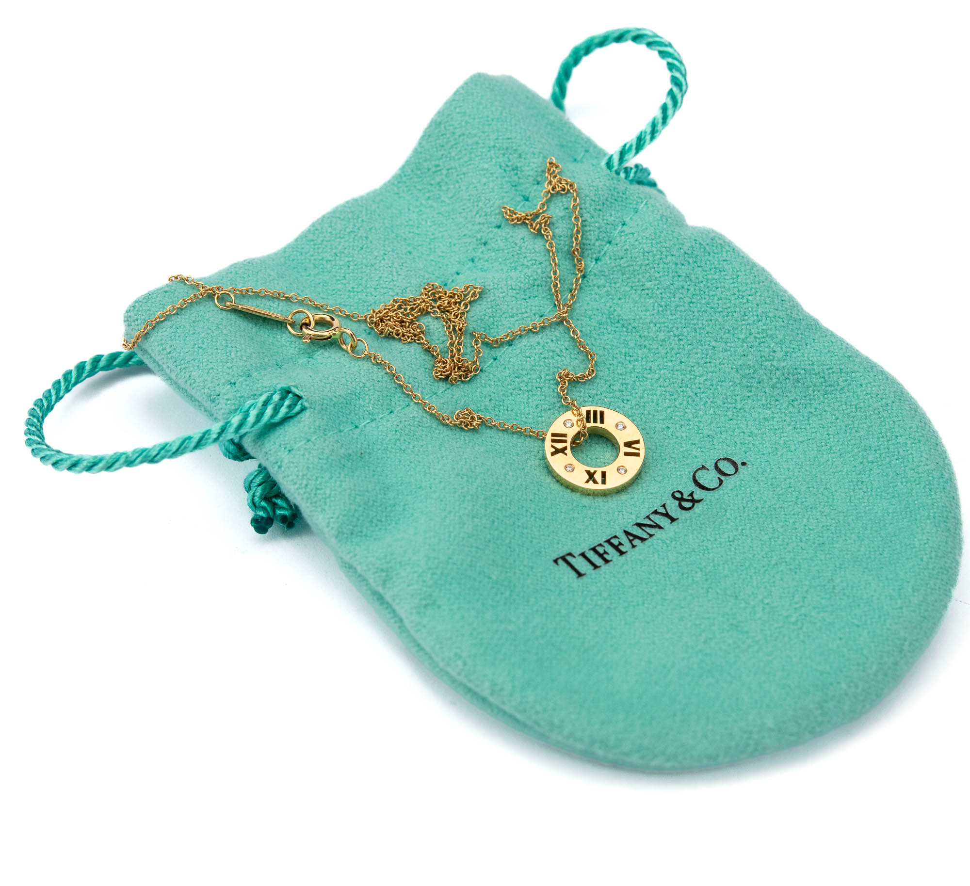 Tiffany & Co kuldkett ripatsiga,750 kuld 4 briljandiga Tiffany & Co kuldkett ripatsiga,750 kuld 4 briljandiga
